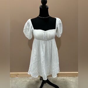PRINCESS POLLY WHITE PUFFY SLEEVE BABY DOLL MINI DRESS WITH TIRD BACK SIZE S